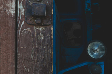 Blue tractor and barn gate doors