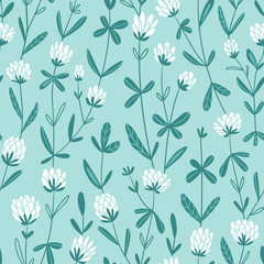 Fototapeta na wymiar White clover flowers. Vector floral seamless pattern. Cute hand-drawn pattern design for fabric, wallpaper or wrap paper.