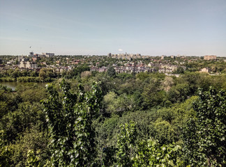 Obraz premium Cityscape. Amazing panorama of the with beautiful blue sky towering over the town. Beautiful view with an epic sky 