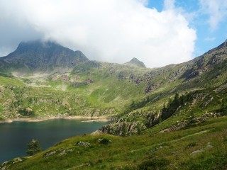 The "Laghi Lakes", in the Orobie Alps: A small valley with pastures, woods and lakes Among the Italian Mountains, near the town of Bergamo - August 2019.