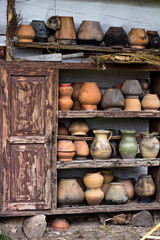 Fototapeta na wymiar Collection of clay pots in the Museum