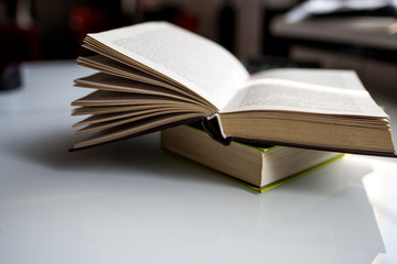 old books on wooden table