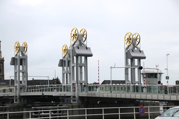 Stadsbrug bridge with gold plated wheels over river IJssel in the city of kampen