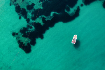 Croatia. Boat and sea as a background from top view. Turquoise water background from top view. Beach and waves. Travel - image