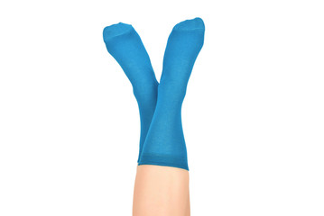 Woman in blue socks isolated on white background. Top view.
