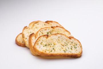 Slice garlic bread on white background