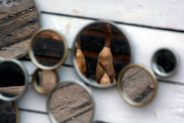 On wood, ducks and mirrors