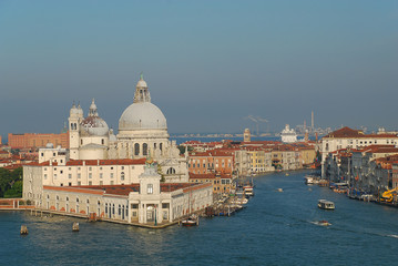 Obraz na płótnie Canvas Venice, Italy: Basilica di Santa Maria della Salute und Punta della Dogana, Grand Canal. In the morning sun
