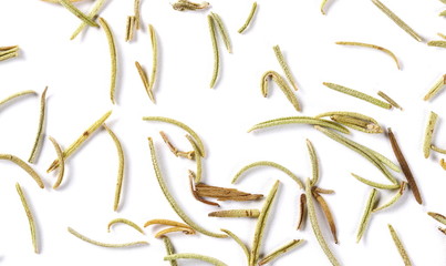 Pile of dry rosemary macro isolated on white background and texture, top view