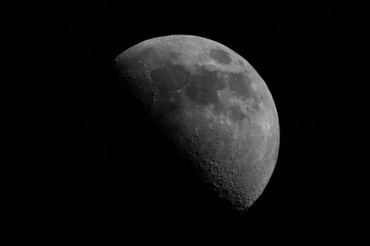 I took a picture of the first quarter moon using pentax 500mm+canon x2 converter. You can see the craters on the moon' surface.