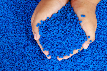 Close-up of plastic polymer granules, polymer plastic, polymer pallet, Plastic ball. plastic...