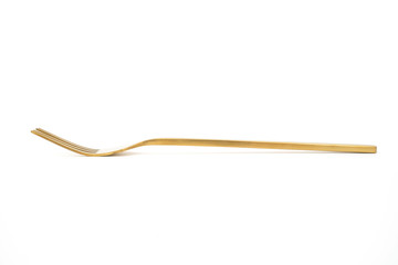 golden fork isolated on a white