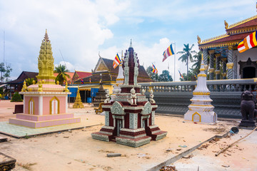 Stupa, traditional Buddhist burial gravestones at a temple in a rural area of Cambodia
