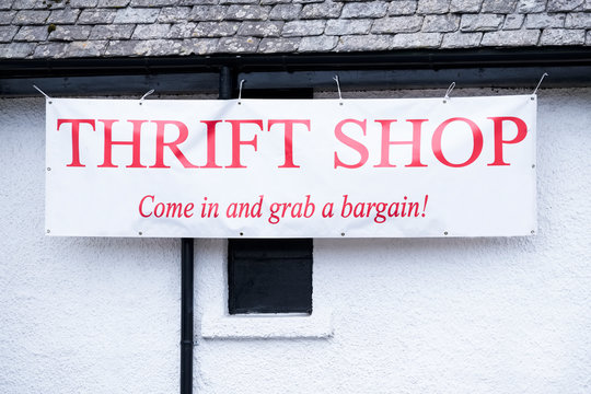 Thrift Charity Shop Banner Sign In Poor Rural Town Uk