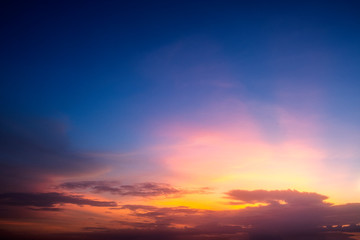 Naklejka na ściany i meble Dramatic beautiful sunset. Orange and yellow colors sky light. - Image