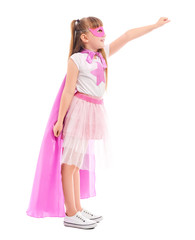 Naklejka premium Cute little girl dressed as superhero on white background