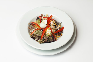 vegetable salad on a white plate