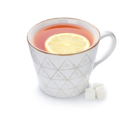 Cup of hot tea with lemon on white background