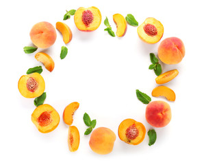 Frame made of ripe peaches on white background