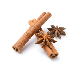 Aromatic cinnamon sticks on white background