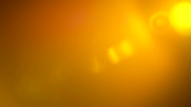Light leaks elements and lens flares on black background. Vintage worm lens flares