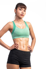 Fitness woman white background. Asian woman. Hands on hip, looking confident.