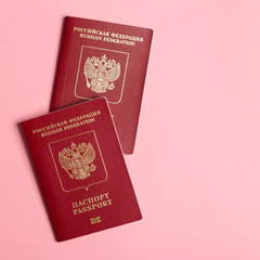 Russian passport on pink background. Travel concept.