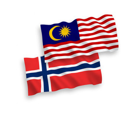 Flags of Norway and Malaysia on a white background