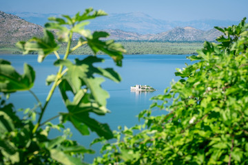 Skadar Lake in Montenegro, wetland and mountain views.