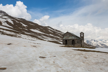 Old stone church at Gavia pass, an alpine pass of the Southern Rhaetian Alps, marking the administrative border between the provinces of Sondrio and Brescia, Italy.
