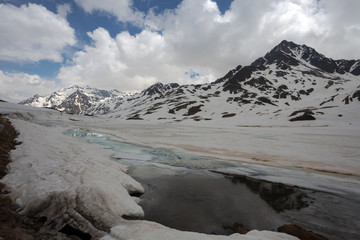View from the Gavia pass, an alpine pass of the Southern Rhaetian Alps, marking the administrative border between the provinces of Sondrio and Brescia, Italy.