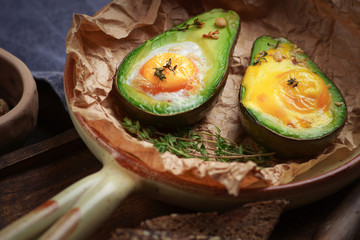 Toasts with avocado and poached egg, tomatoes and spinach, On a light gray background, Fresh morning breakfast
