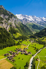 Aerial view of lauterbrunnen Valley and Jungfrau swiss alps behind, Switzerland.