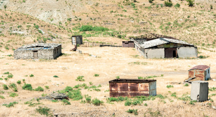 Abandoned farm buildings in the steppe