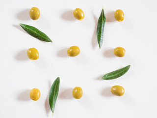Pitted olives pattern on white background