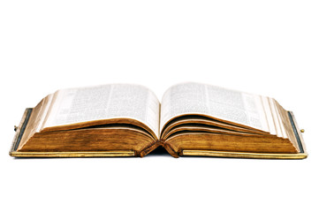 opened old Bible on white