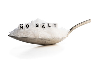 Spoon full of sea salt. No salt concept