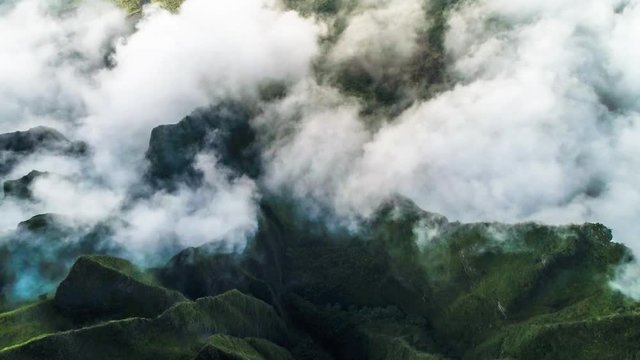 Aerial shot of the cliff mountain and the sea in Na Pali coast in Kauai Hawaii