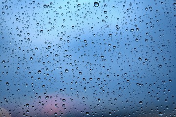 droplets of rainwater on the glass