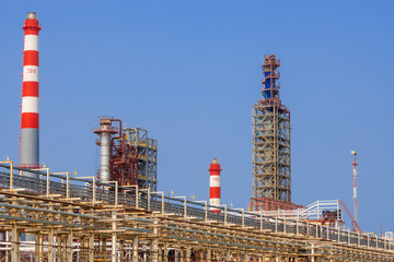 low angle view of metal pipes of industrial plant outdoor 