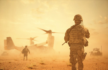Military helicopters and forces between storm & dust in battlefield