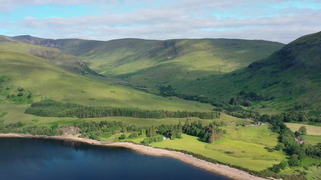 Aerial view of Loch Eil/Linnhe situated in landscape of Scottish Highlands, lush green hills and deep lake - panorama of Highlands of Scotland from above, United Kingdom, Great Britain, Europe