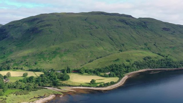 Aerial view of Loch Eil/Linnhe situated in landscape of Scottish Highlands, lush green hills and deep lake - panorama of Highlands of Scotland from above, United Kingdom, Great Britain, Europe