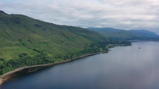 Aerial view of Loch Eil/Linnhe situated in landscape of Scottish Highlands, lush green hills and deep lake - panorama of Highlands of Scotland from above, United Kingdom, Great Britain, Europe
