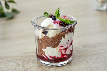 dessert with chocolate and berries in the glass