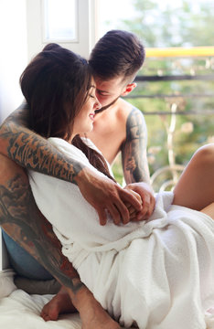 Young Tattooed Stylish Couple In Love