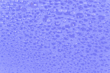 water drops on a blue surface