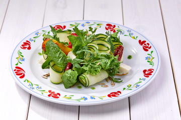 zucchini rolls with fresh salad