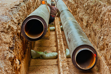 Repair Work Of Heating Duct. Replacement Pipes Of The Utility infrastructure. Underground utility