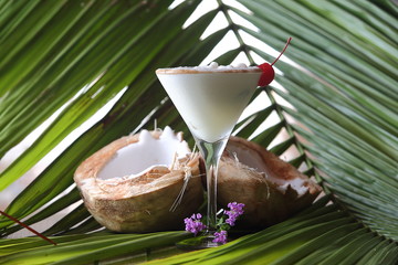 The Pina Colada is a sweet cocktail made with rum, coconut cream or coconut milk, and pineapple juice. It may be garnished with either a pineapple wedge, maraschino cherry, or both.